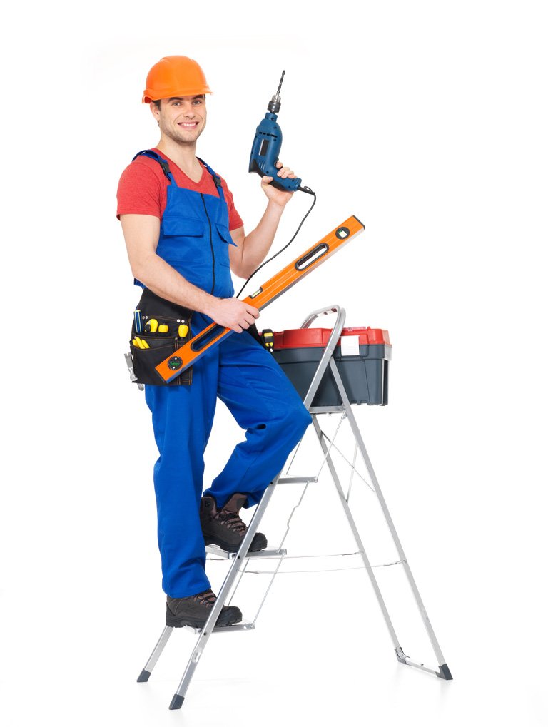 divi-renovator-theme-2 A man stand on the stairs and hold the drill maching in the hands